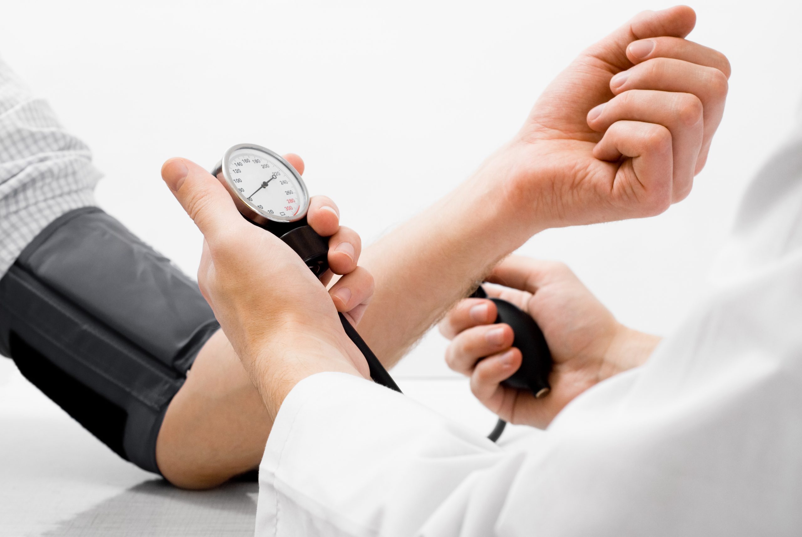Doctor measuring blood pressure